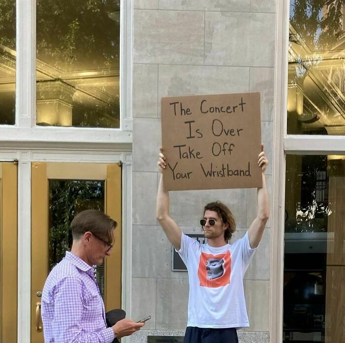 Clever-Dude-With-Sign-Annoying-Things-Protesting
