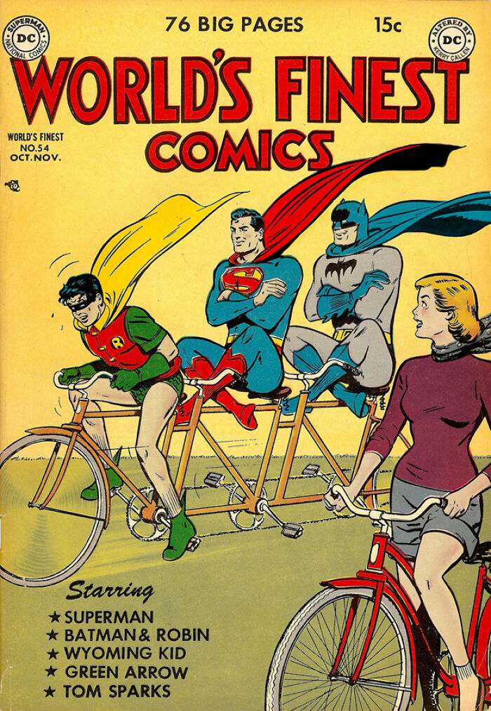 Vintage DC comic cover featuring Superman, Batman, and Robin on a tandem bicycle in a humorous makeover style