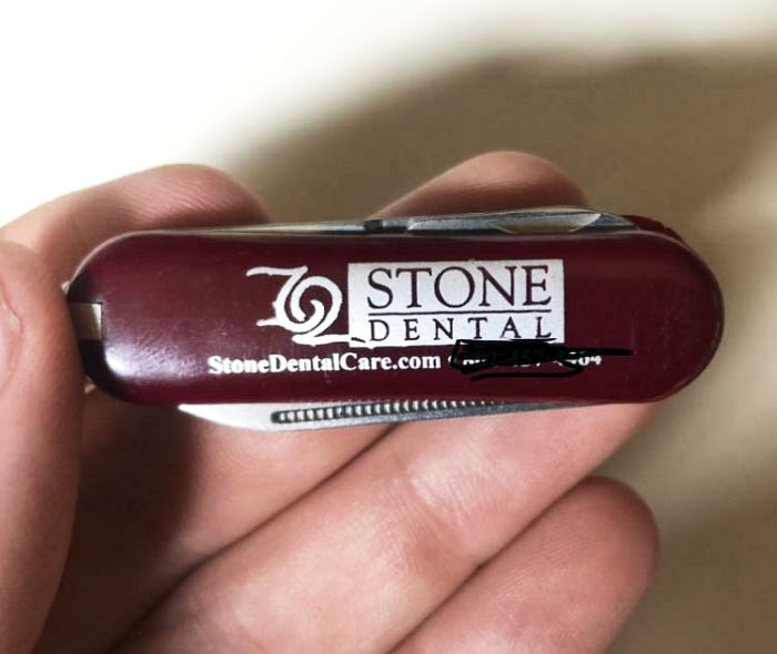 My Dentist's Office Gives Out Pocket Knives Instead Of Business Cards