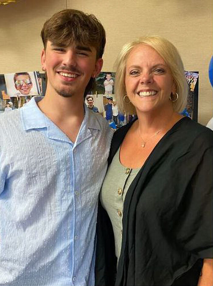 Teacher and student smiling together, highlighting emotional connection through a meaningful tattoo tribute.
