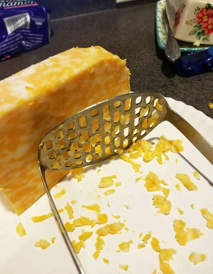 Asked A Friend To Grate Some Cheese. After A Few Minutes, He Asked What He Was Doing Wrong, And It Seems That He Was Trying To Force The Cheese Through The Potato Masher 