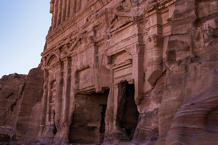 Ancient rock-cut facades carved into red sandstone cliffs, a place visited that lived up to the hype