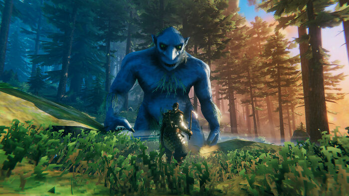 Player facing a large blue troll monster in a forest scene from a favorite game gamers could play every day.