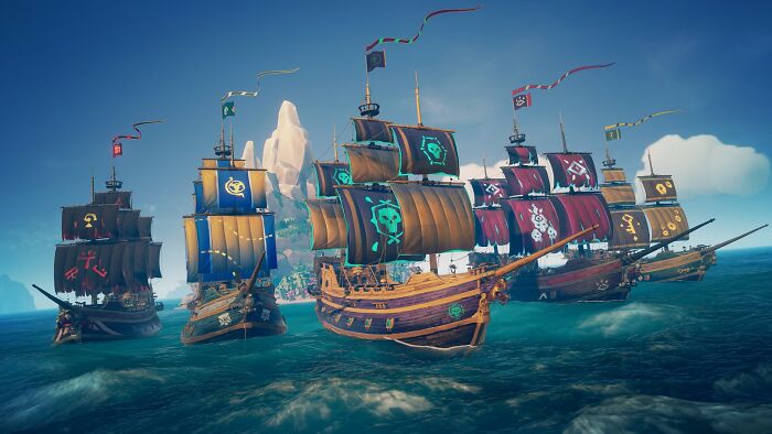 Colorful pirate ships from a popular video game sailing together, illustrating gamers sharing their all-time favorite games.