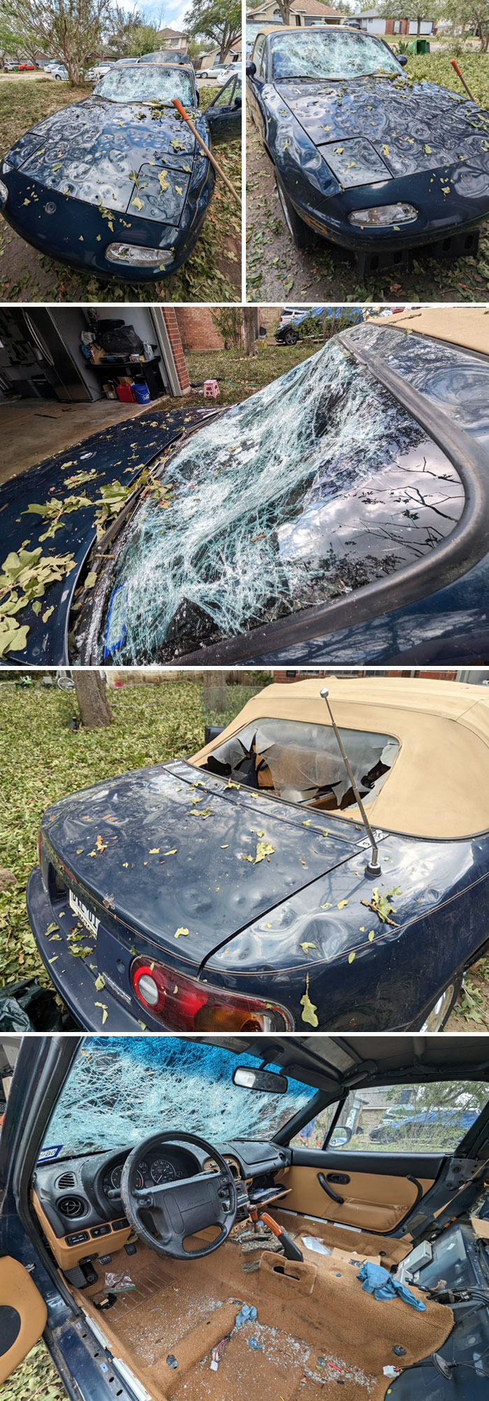 Blue car with shattered windows and dented roof, showing damage caused by severe hailstorm and nature’s force.
