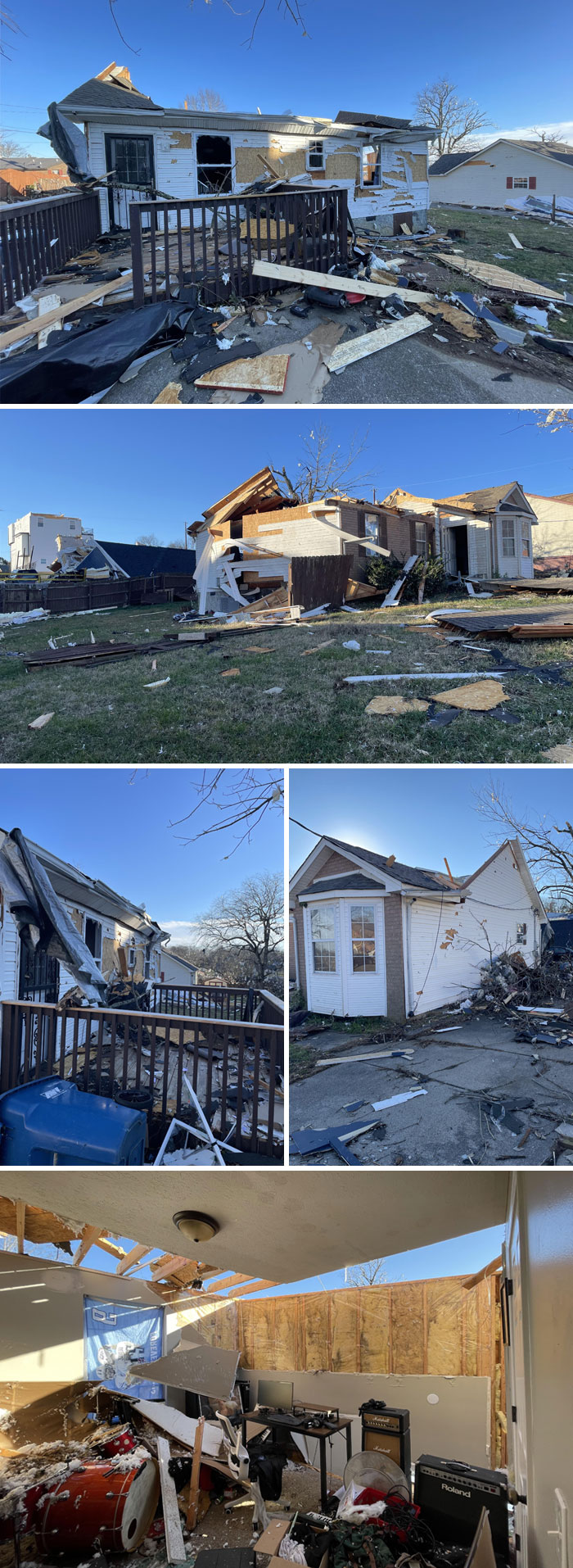 Severely damaged house with debris scattered around, showcasing wild nature's destructive power and force of storms.