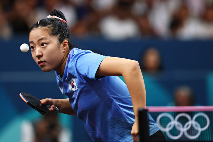 Korea’s Shin Yu-bin Seems To Freeze The Ball Mid-Air Before Sending It Back To Her Chinese Rival During The Women’s Table Tennis Semi-Final