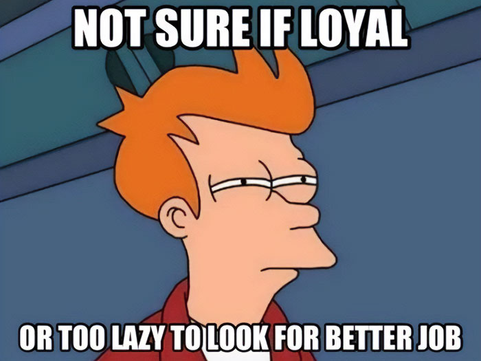 Futurama's Fry questioning loyalty or laziness in a work anniversary meme.