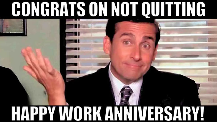 Michael Scott shrugging with text "Congrats on not quitting, happy work anniversary!" in a humorous work anniversary meme.