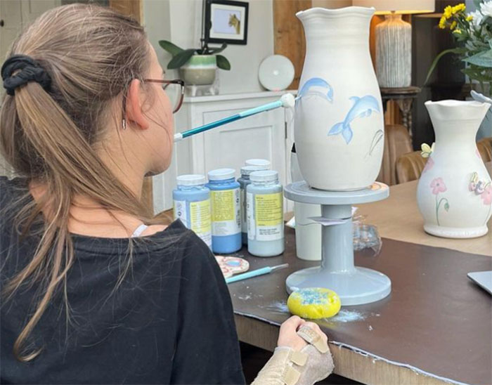 Painter Who Was Paralyzed At 13 Uses Her Mouth To Paint On Her Sister&rsquo;s Ceramics, Goes Viral Online