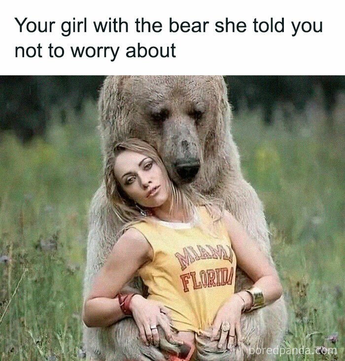 A woman leaning against a bear in a field, illustrating a humorous meme about relationships with memes that make fun of everything.
