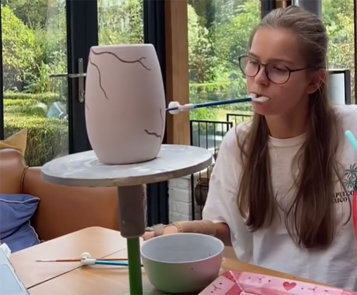 Painter Who Was Paralyzed At 13 Uses Her Mouth To Paint On Her Sister&rsquo;s Ceramics, Goes Viral Online