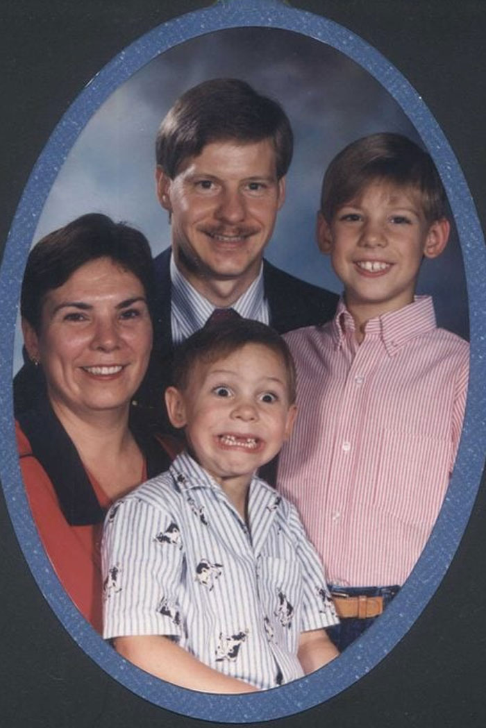 reads, "When life gives you lemon," and below, it says, "Run." ChatGPT said: ChatGPT A vintage-style family portrait featuring four members: a smiling mother, a father with a mustache, and two young boys. One boy is standing calmly, while the other is in the front making an exaggerated, wide-eyed, goofy expression, adding a comedic element to the otherwise formal family photo. 