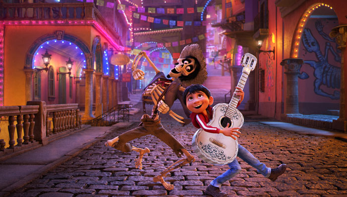 A lively scene from the movie Coco featuring a young boy holding a white guitar with intricate designs and a skeleton wearing a hat, both joyfully dancing on a cobblestone street. The background shows colorful buildings adorned with lights and papel picado banners, creating a festive atmosphere in the Land of the Dead. A lively scene from the movie Coco featuring a young boy holding a white guitar with intricate designs and a skeleton wearing a hat, both joyfully dancing on a cobblestone street. The background shows colorful buildings adorned with lights and papel picado banners, creating a festive atmosphere in the Land of the Dead.
