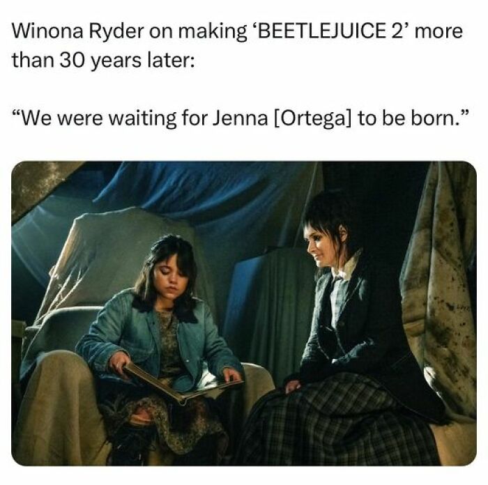 Two people in a dimly lit room with draped fabric, featuring a humorous text about "Beetlejuice 2" and Netflix memes.