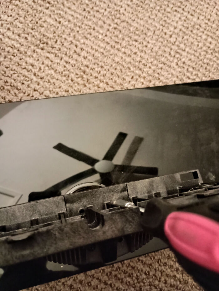 The Screwdriver Slots In This TV Stand