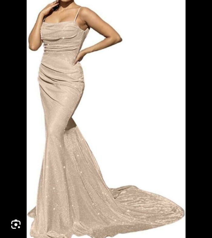 Elegant wedding dress showcased against a white background.