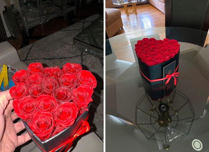 Heart-shaped bouquet of red roses in a black box with red ribbon, showcasing durable and long-lasting floral arrangement.
