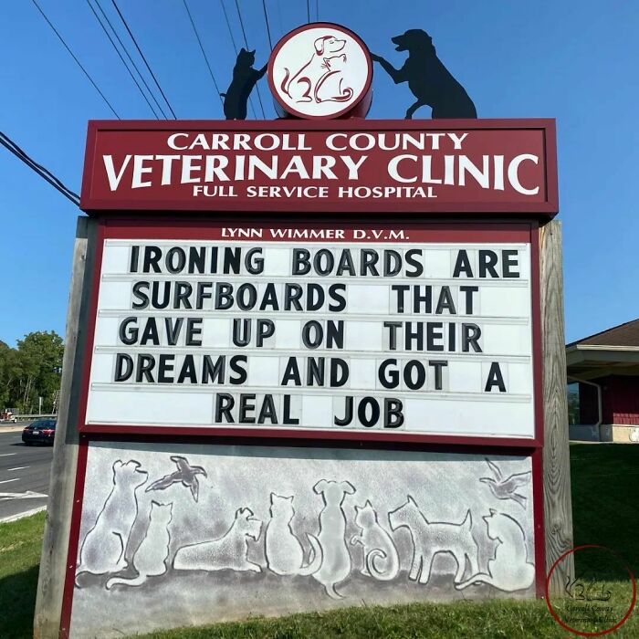 Vet hospital sign with a joke: "Ironing boards are surfboards that gave up on their dreams and got a real job."