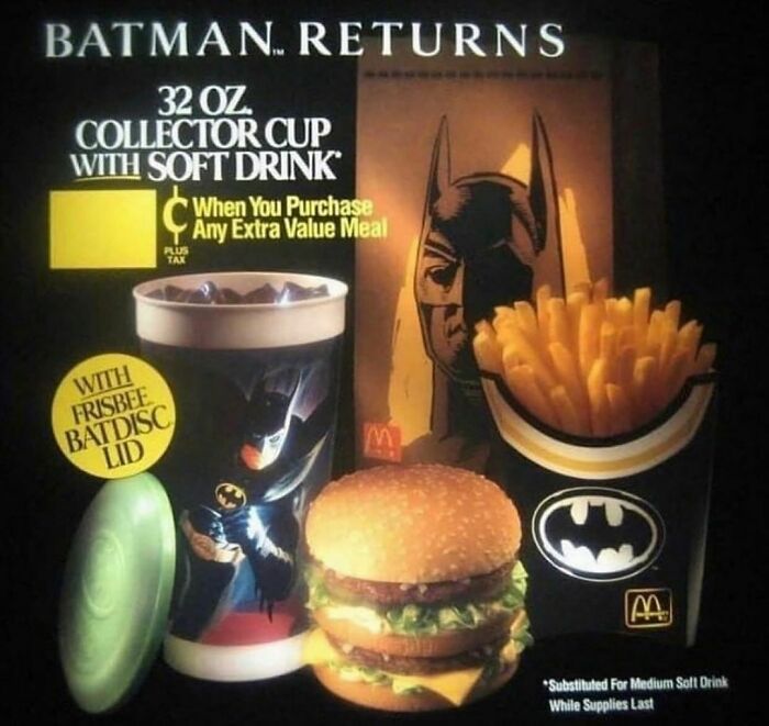 Batman Returns 32 oz collector cup with soft drink, fries, and burger from a nostalgic McDonald's meal promotion.