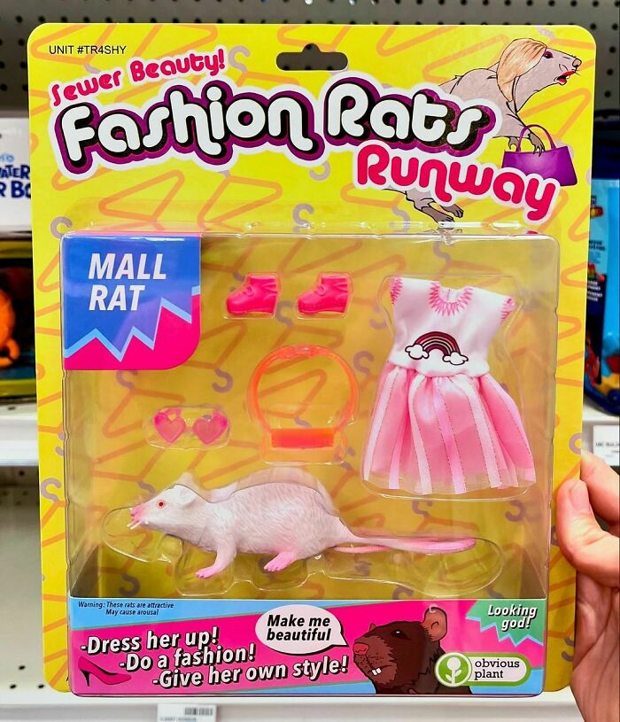 Funny fake product by Obvious Plant: "Fashion Rats Runway" toy featuring a rat with dress and accessories in a store.