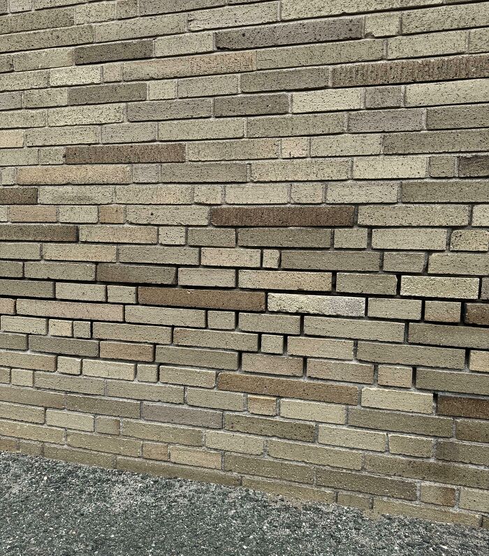 The Mortar Between The Bricks At My Daughter's School Has Been Eroded By 65 Years Of Children Running Their Hands Through It