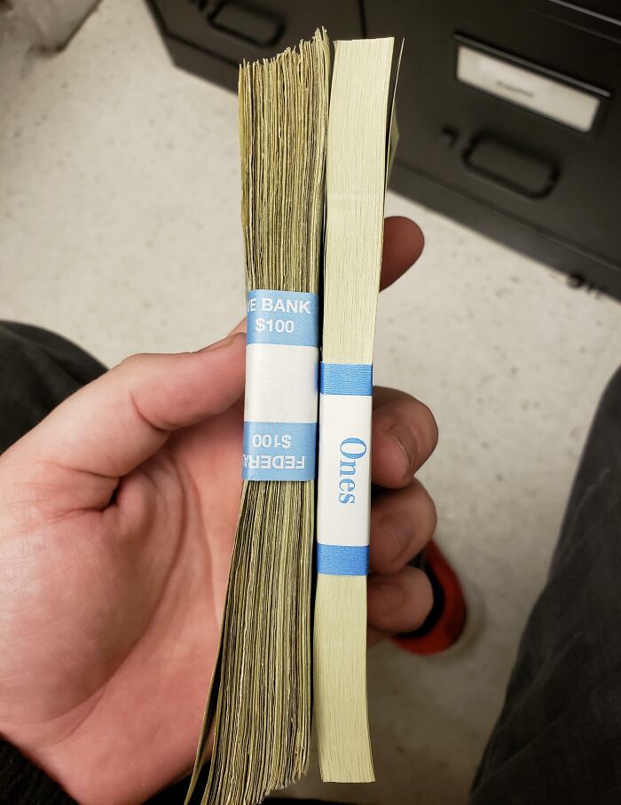 The Difference In These Stacks Of $1 Bills That Are Used vs. New