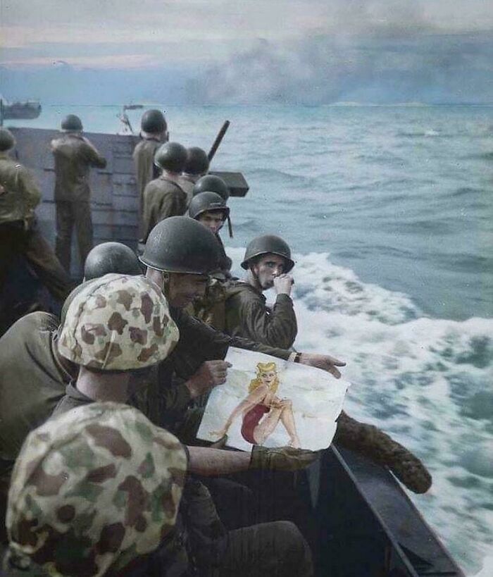 U.S. Marines Take A Last Look At A Pin-Up Girl Before Landing On The Japanese Held Island Of Betio In The Tarawa Atoll On November 20th Of 1943