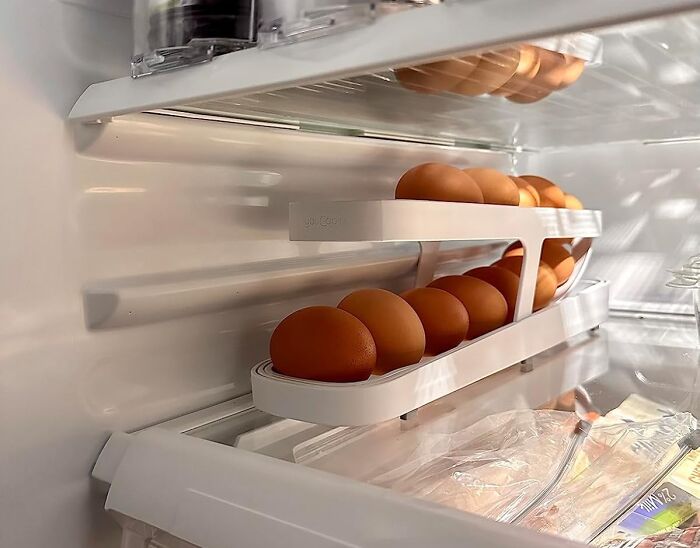 No More Eggsplosions In Your Fridge! Keep Your Eggs Organized And Accessible With This Rolldown Egg Dispenser