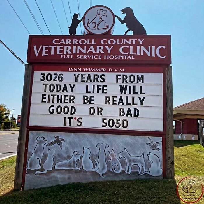 Veterinary clinic sign with humorous joke predicting life's future as 50/50 chance.
