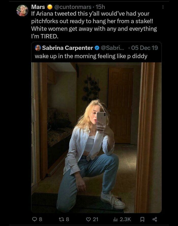 Tweet discussing double standards with a selfie showing a woman posing indoors, highlighting facepalm moments and lack of logic.