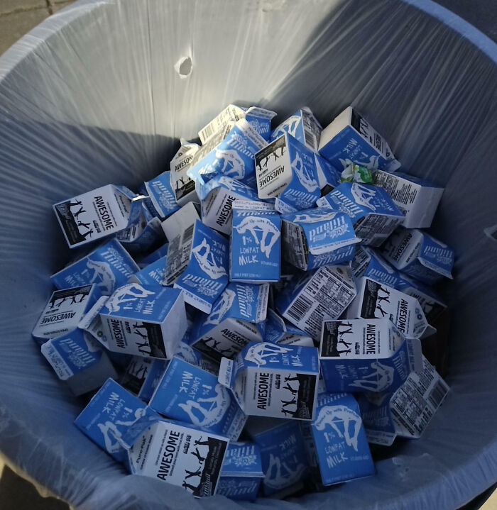About Half Of This 50-Gallon Trash Can Is Full Of Perfectly Good Cartons Of Milk, Expiration Date Is In 2 Weeks. Schools Waste A Lot Of Food