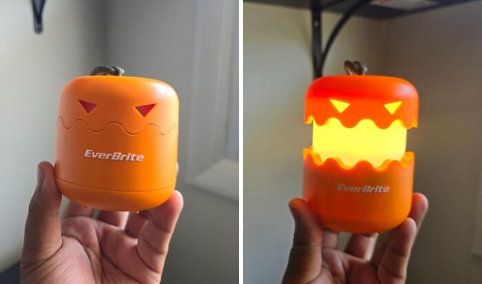 Orange EverBrite Halloween light held in hand, a creative non-candy treat for Halloween celebrations.