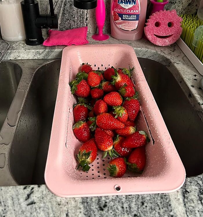 Tired Of Chasing Rogue Vegetables Down The Drain? This Over The Sink Colander Will Catch Every Last Pea (And Maybe Even A Few Stray Noodles)