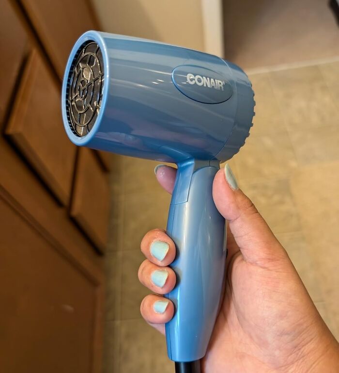 Bad Hair Days On Vacation? Not On This Dryer's Watch! This Travel Hair Dryer With Dual Voltage Will Keep Your Locks Looking Fabulous No Matter Where Your Jet-Setting Takes You