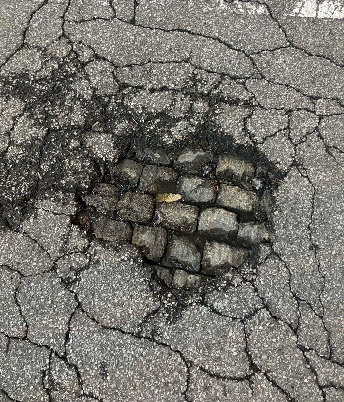 In Downtown Cincinnati, All The Roads Used To Be Cobbled Instead Of Asphalt, And Apparently They Never Tore It Up