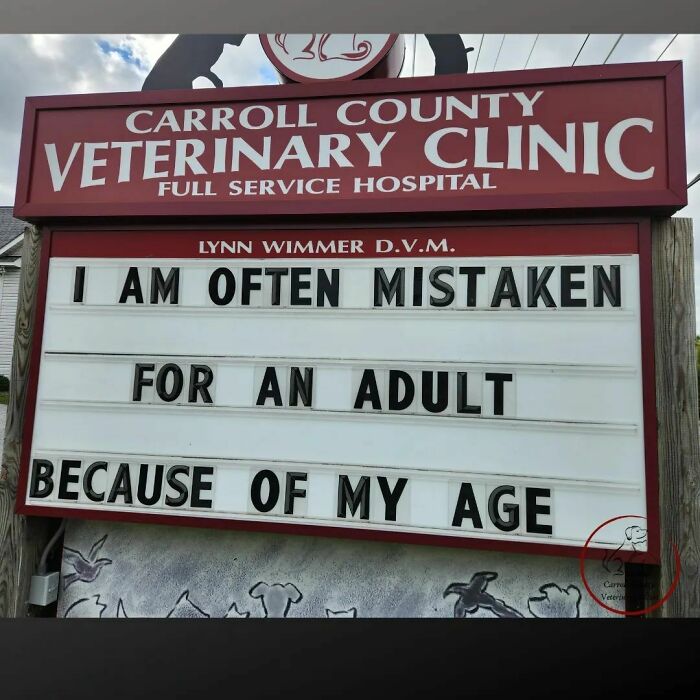 Vet clinic sign with a humorous age-related joke.