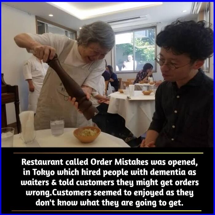 Elderly waiter serving food with pepper mill in a Tokyo restaurant featured in fascinating amazing facts.