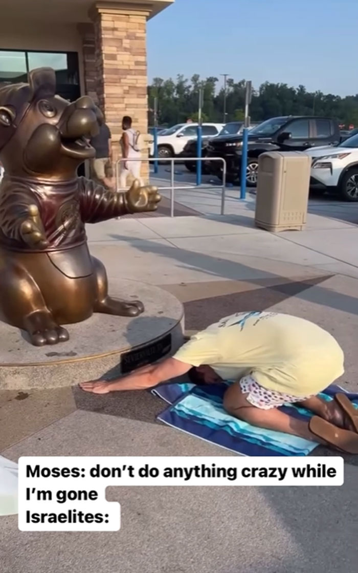 Person humorously bowing to a statue with caption about Moses and Israelites; funny Christian meme.