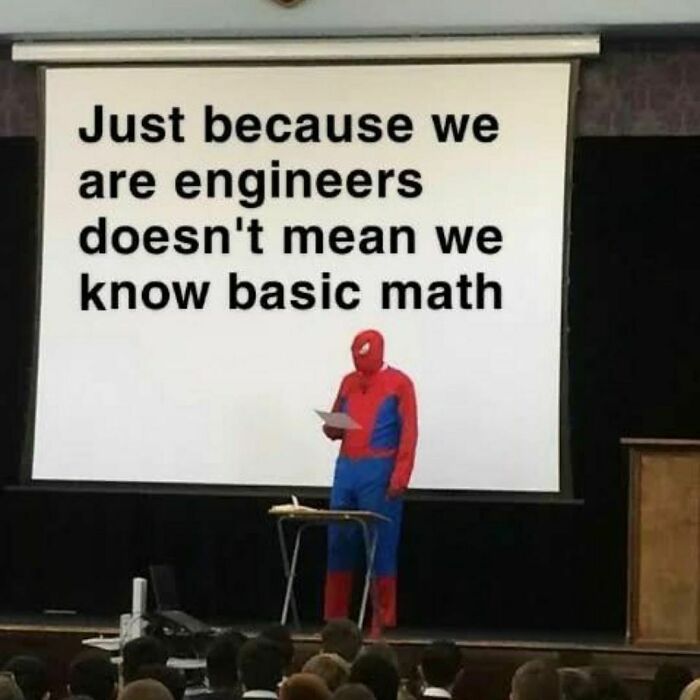 Spider-Man costume-wearing person stands in front of projector displaying a funny engineer meme.