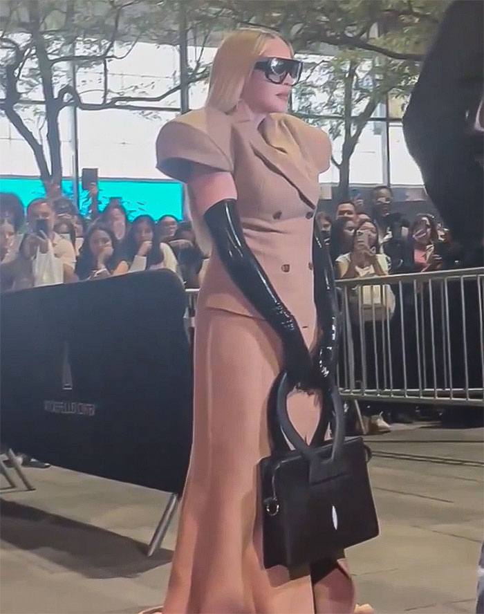 "Take Them Silly Glasses Off": Madonna Stumbles While Arriving Late To New York Fashion Week Show "Take Them Silly Glasses Off": Madonna Stumbles While Arriving Late To New York Fashion Week Show