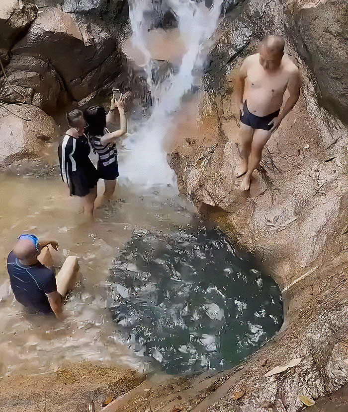 Man Jumps Off Cliff Into Water Hole And Completely Disappears, People Frantically Search For Him