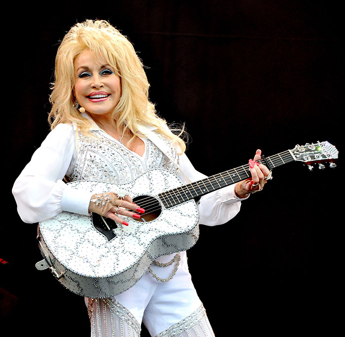 Dolly Parton Says She'd Duet With Beyonc&eacute; Live, But Defends The CMA Awards After Nomination Snub
