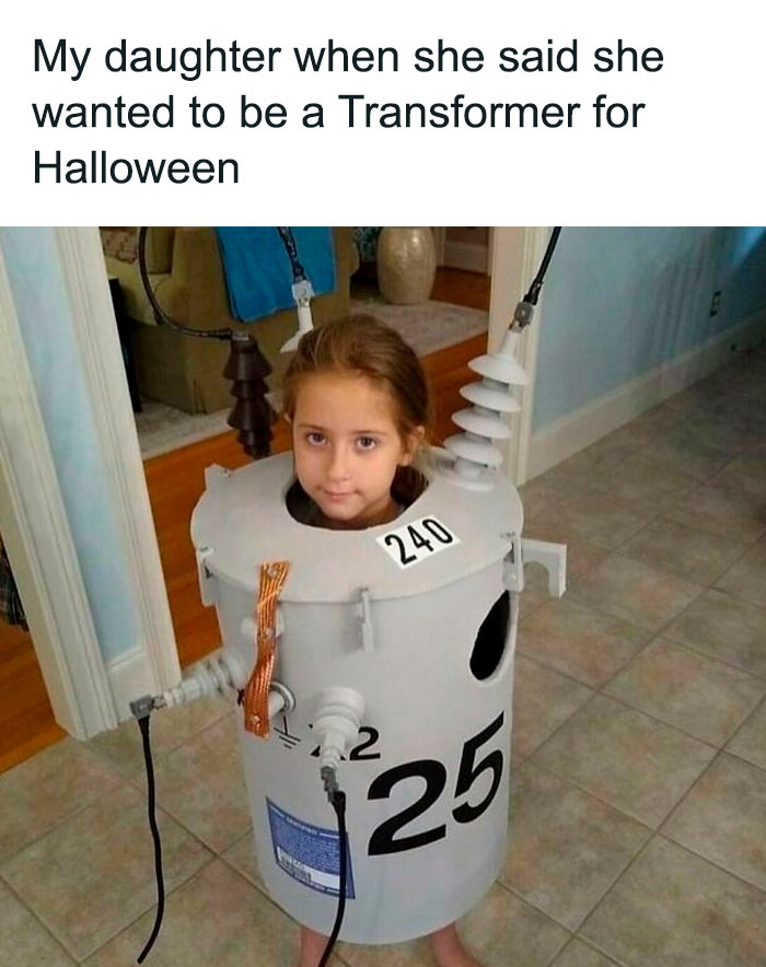 Young girl in a transformer costume, humorously capturing an engineer meme moment indoors.