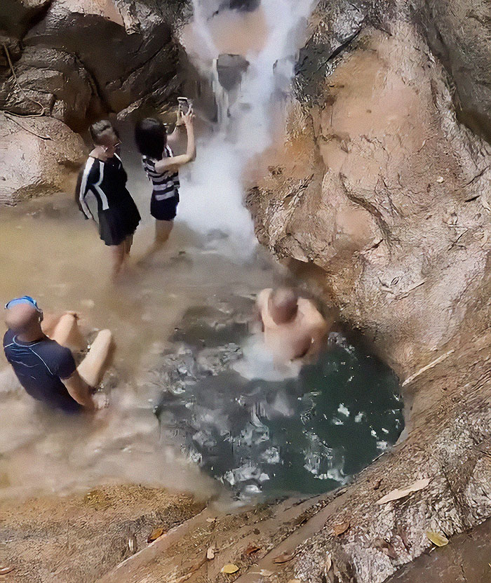 Man Jumps Off Cliff Into Water Hole And Completely Disappears, People Frantically Search For Him