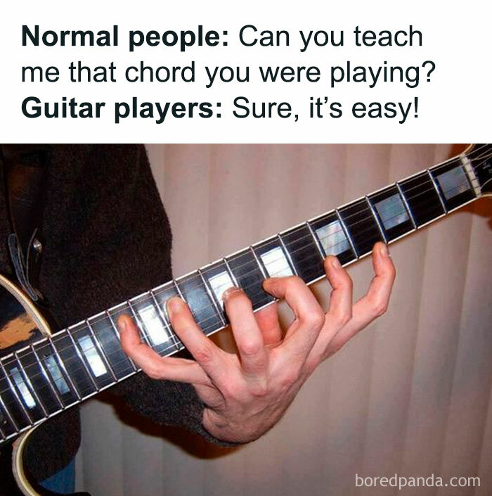 Guitar player humor meme showing complex finger position on a guitar fretboard.