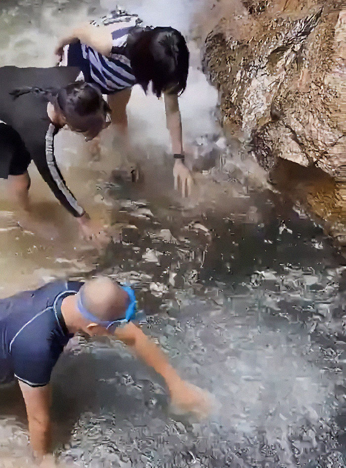 Man Jumps Off Cliff Into Water Hole And Completely Disappears, People Frantically Search For Him