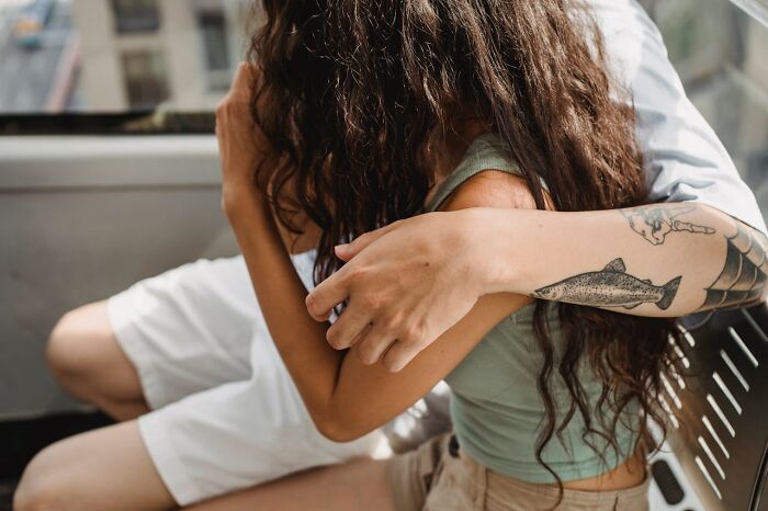 Couple embracing closely, highlighting emotions and connection in a moment women want men to understand.