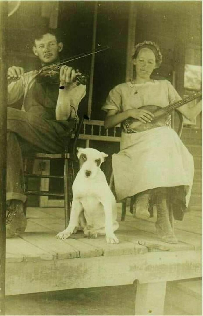 Old-Time Appalachian Musicians With A Pooch On The Porch