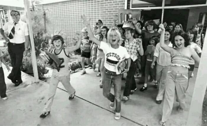 Kids Cheering On The Way Out The Door On The Last Day Of School, 1977